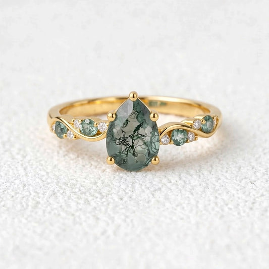 Flora’s Sprig | Pear Cut Moss Agate Engagement Ring.