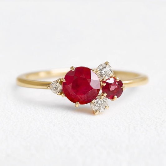 Rosalind’s Rose | Round Ruby Engagement Ring with Drifting Diamond Petal Halo