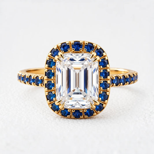 Aurora’s Luminary | 2CT Emerald Cut Diamond Sapphire Halo & Pavé Ring