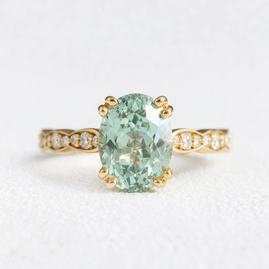 Lydia's Lace | 2CT Oval Green Sapphire Engagement Ring with Lace-Trim Diamond Band.