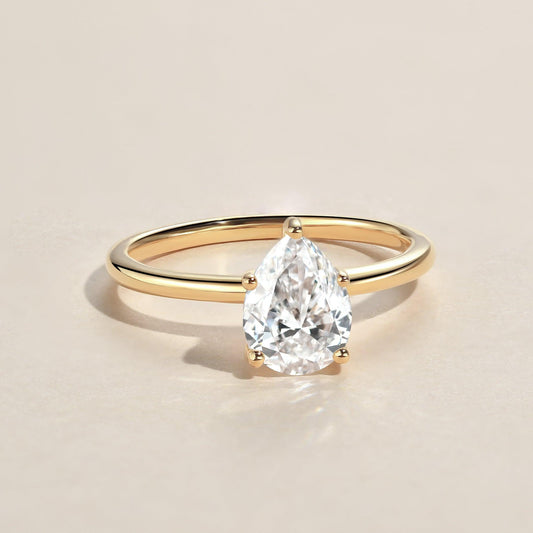 1.0ct Pear Shaped Moissanite Classic Solitaire Ring.