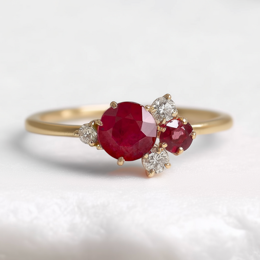 Rosalind’s Rose | Round Ruby Engagement Ring with Drifting Diamond Petal Halo