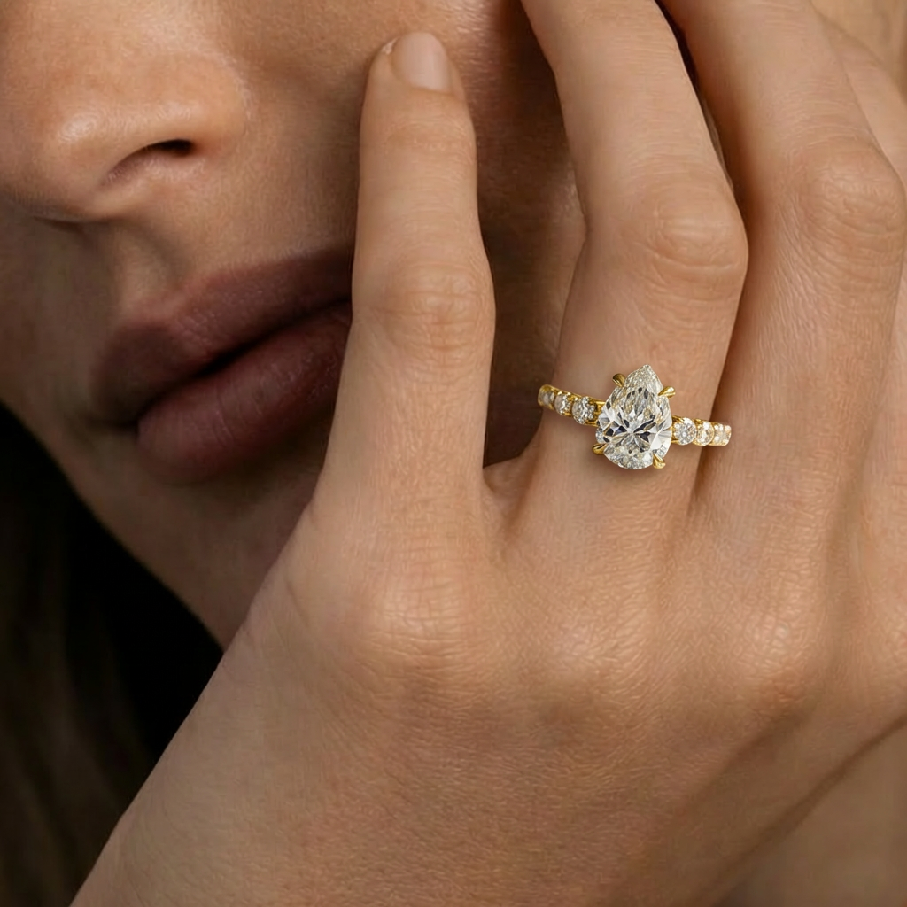 Aurora‘s Whisper | 2CT Pear Cut Moissanite Eternity Ring.