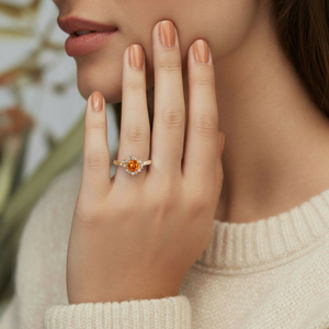 Vivienne’s Amber | Round Cut Orange Sapphire Halo Engagement Ring.