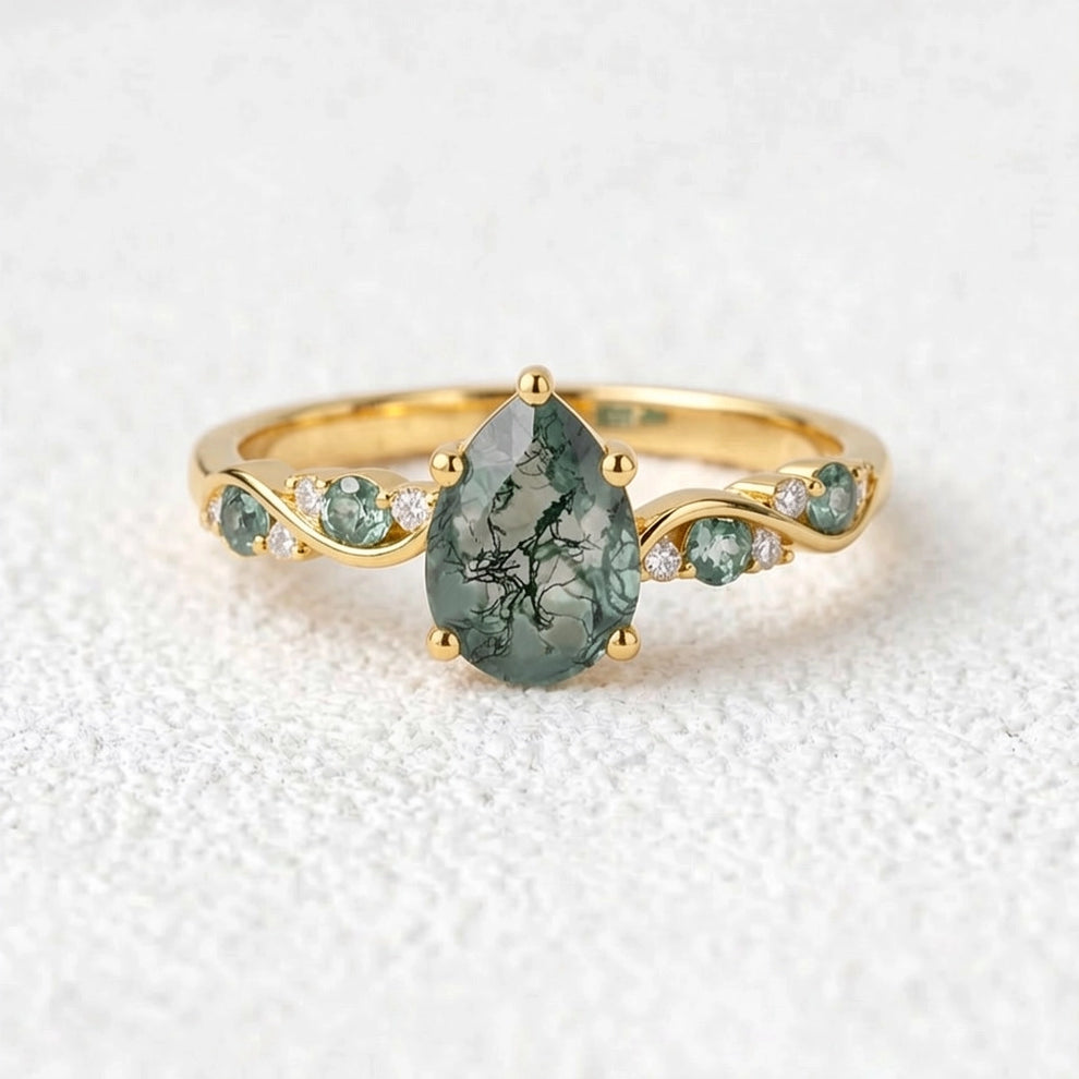Flora’s Sprig | Pear Cut Moss Agate Engagement Ring.