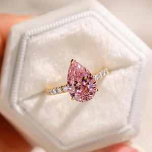 Aurora‘s Grace | 3CT Pear Cut Pink Solitaire Ring.