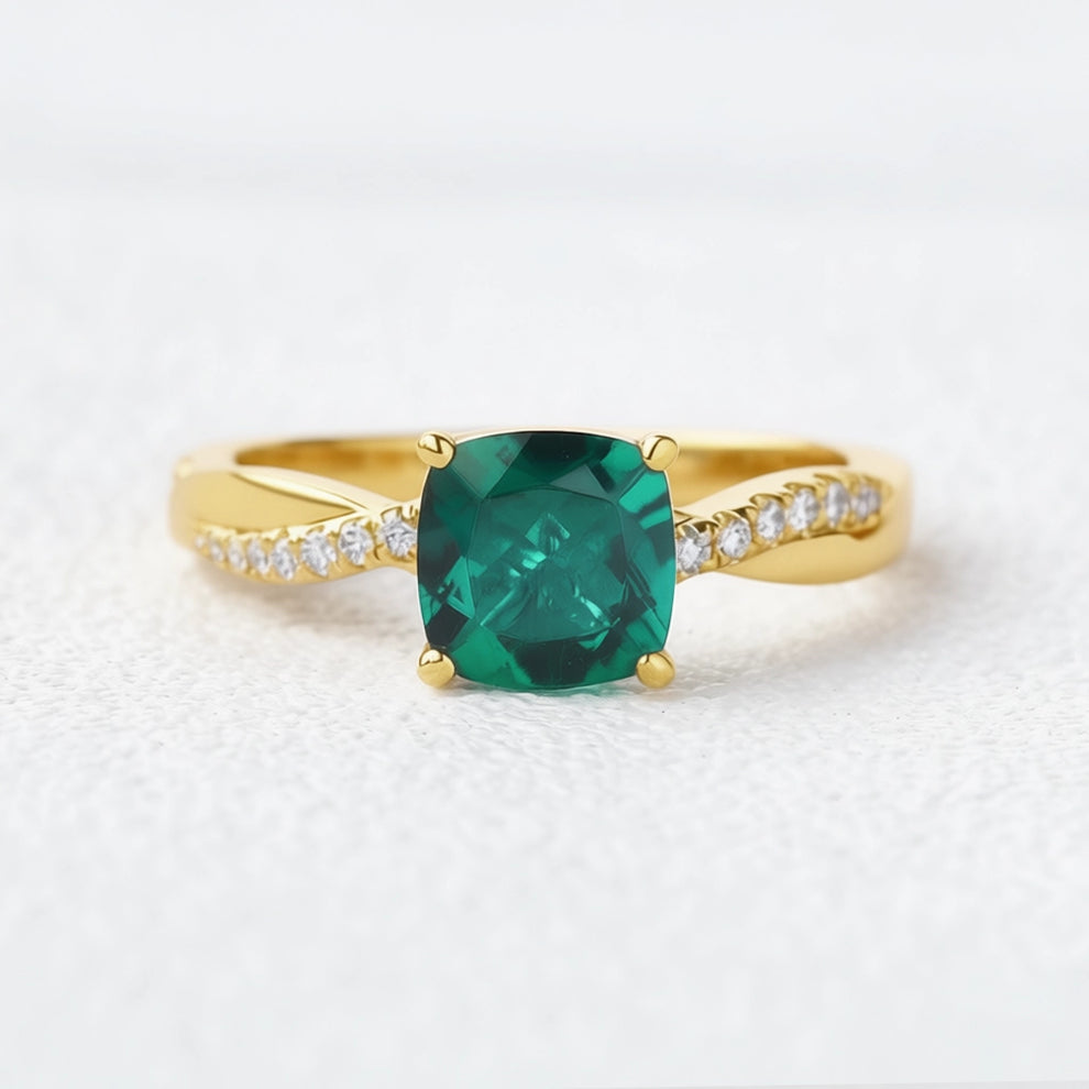 Ivy’s Twist | 2CT Cushion Cut Emerald Solitaire Engagement Ring.
