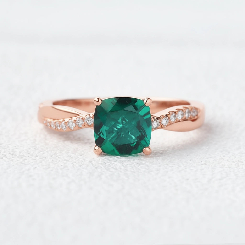 Ivy’s Twist | 2CT Cushion Cut Emerald Solitaire Engagement Ring.