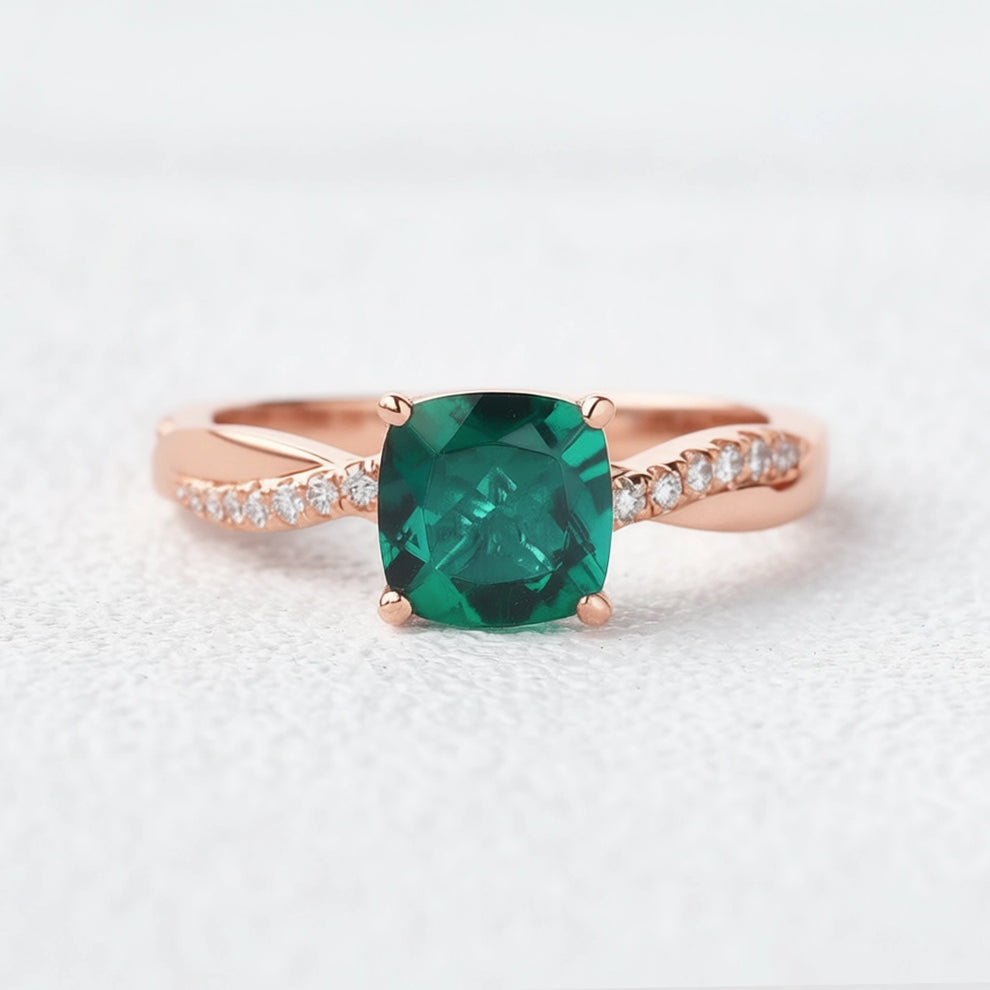 Ivy’s Twist | 2CT Cushion Cut Emerald Solitaire Engagement Ring.