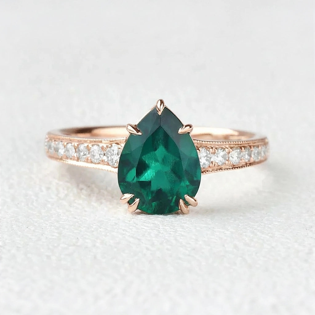Olive’s Whisper | 1.5CT Classic Pear Cut Lab Emerald Engagement Ring.