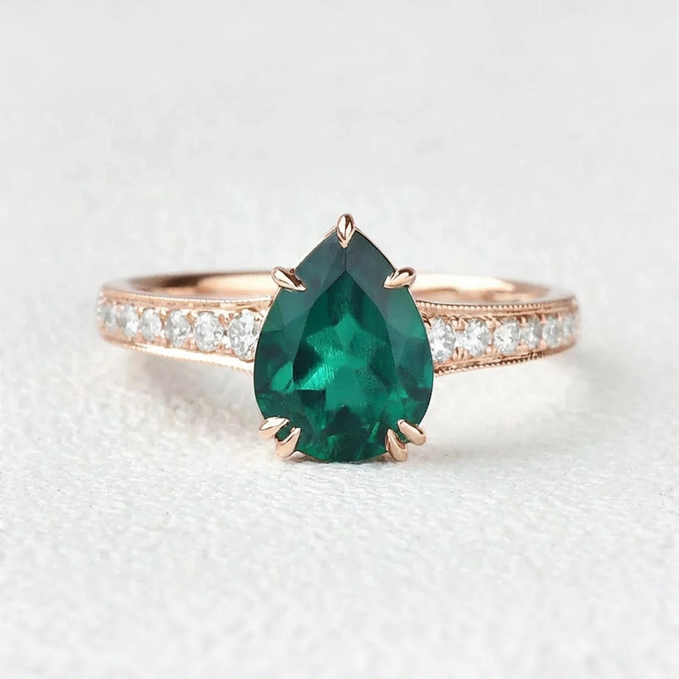 Olive’s Whisper | 1.5CT Classic Pear Cut Lab Emerald Engagement Ring.