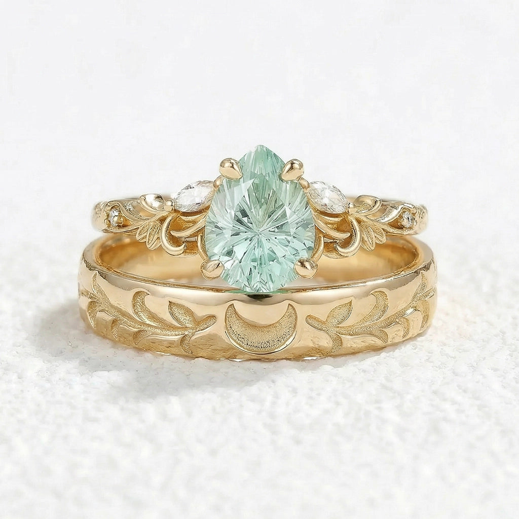 Selene’s Grove | Pear Green Sapphire & Moon Phase Couple Ring Set.