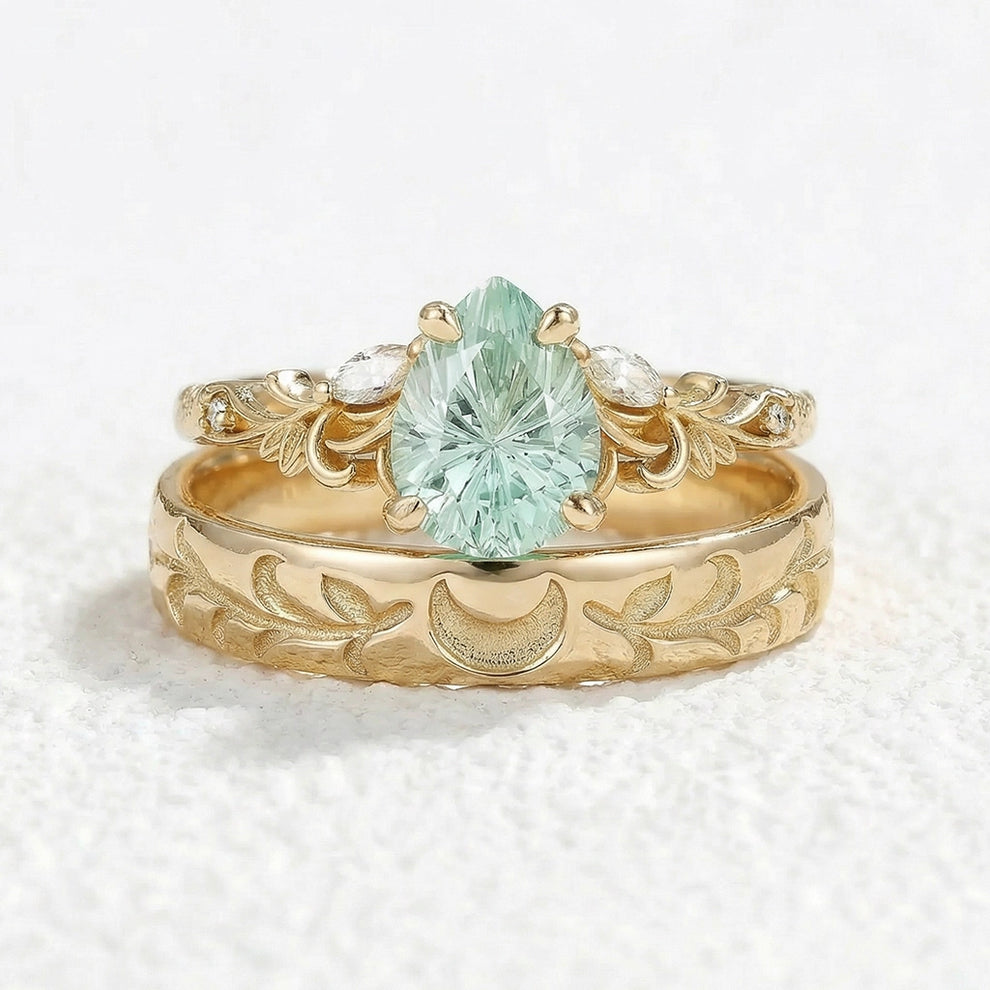 Selene’s Grove | Pear Green Sapphire & Moon Phase Couple Ring Set.