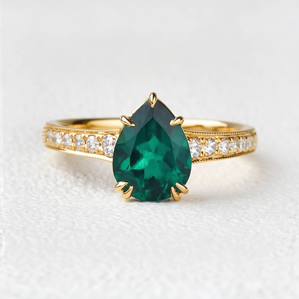 Olive’s Whisper | 1.5CT Classic Pear Cut Lab Emerald Engagement Ring.