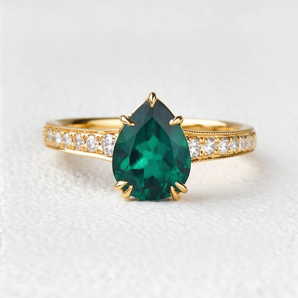 Olive’s Whisper | 1.5CT Classic Pear Cut Lab Emerald Engagement Ring.