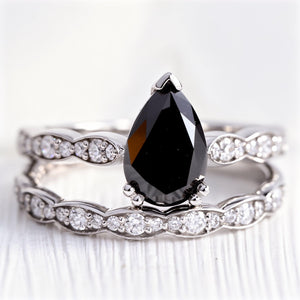Aria‘s Cipher | Pear Cut Black Diamond Ring & Matching Diamond Band Ring Set.