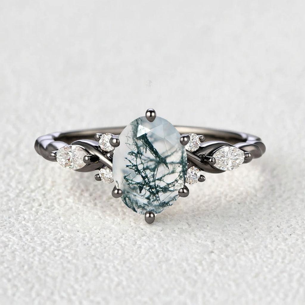 Flora’s Eternal | Oval Moss Agate Infinity Engagement Ring.