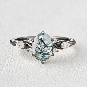 Flora’s Eternal | Oval Moss Agate Infinity Engagement Ring.