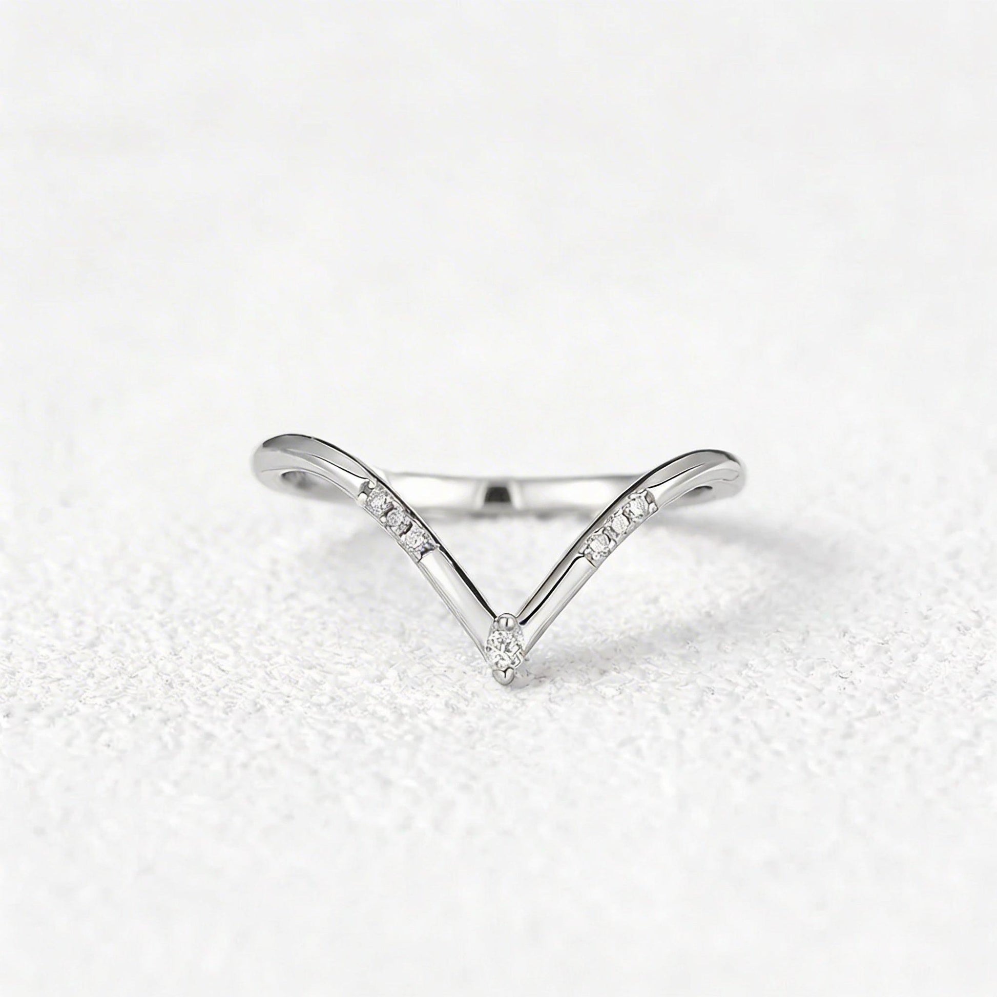 Round Cut Moissanite Half Eternity Curved Wedding Band in Gold.