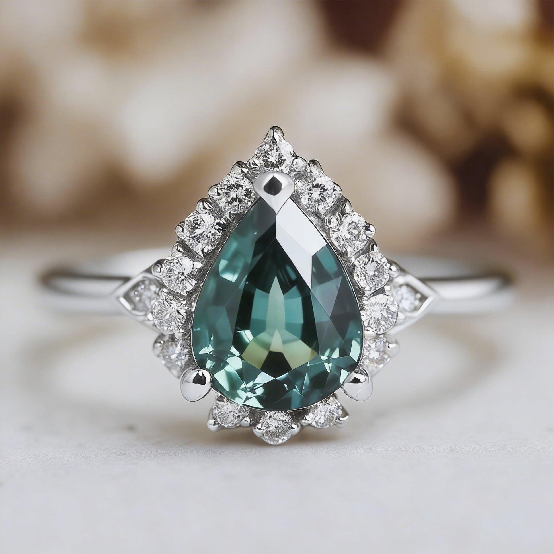 Lyra's Tear | Pear Cut Classic Sapphire Engagement Ring.