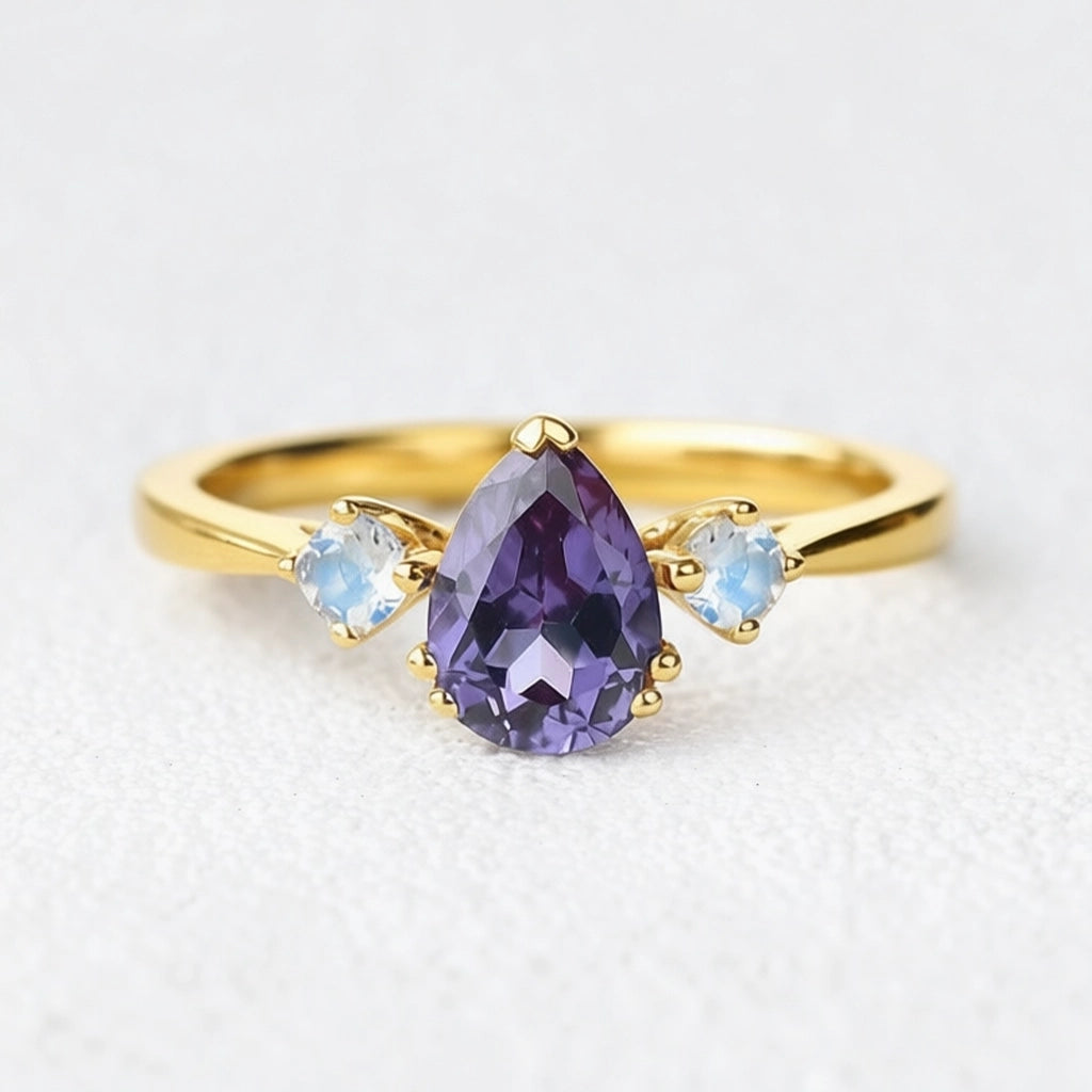 Selene’s Mirage | Pear Tanzanite & Moonstone Engagement Ring