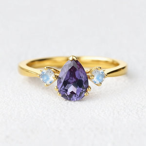 Selene’s Mirage | Pear Tanzanite & Moonstone Engagement Ring