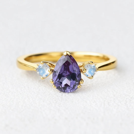 Selene’s Mirage | Pear Tanzanite & Moonstone Engagement Ring