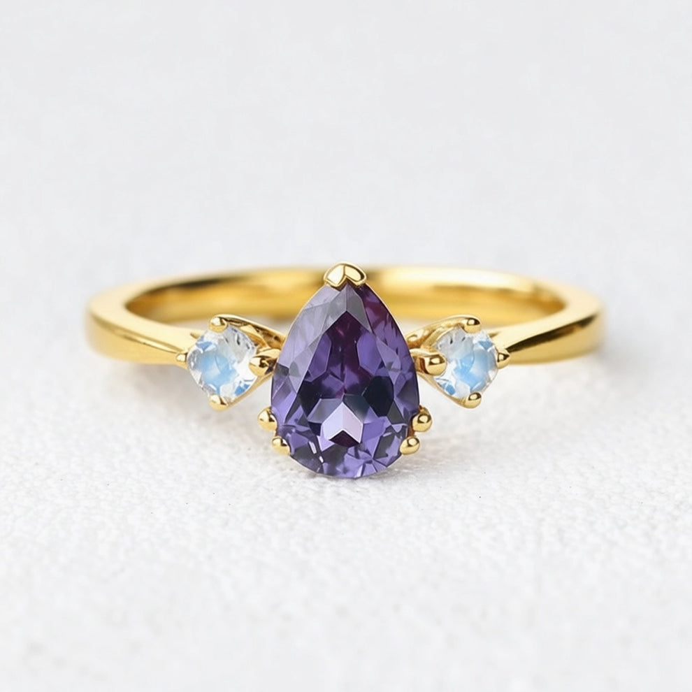 Selene’s Mirage | Pear Tanzanite & Moonstone Engagement Ring