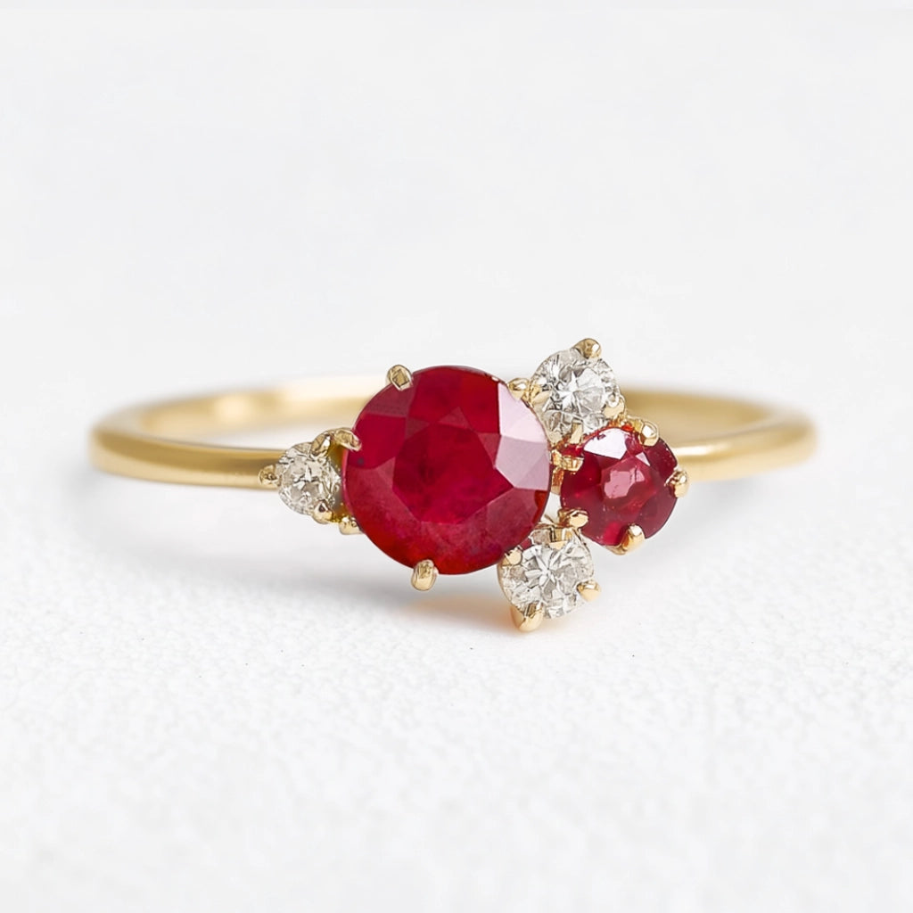 Rosalind’s Rose | Round Ruby Engagement Ring with Drifting Diamond Petal Halo.