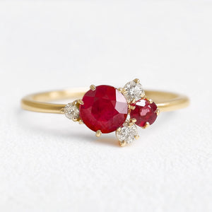 Rosalind’s Rose | Round Ruby Engagement Ring with Drifting Diamond Petal Halo