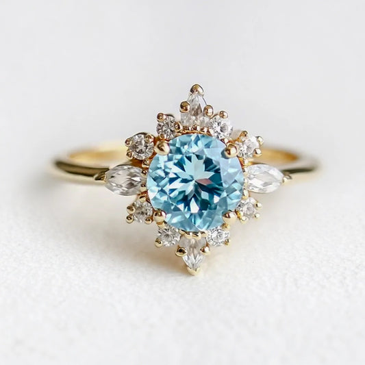 Marina's Swell | Round Cut Aquamarine Halo Engagement Ring.