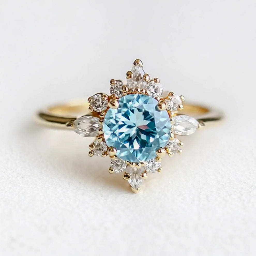 Marina's Swell | Round Cut Aquamarine Halo Engagement Ring.
