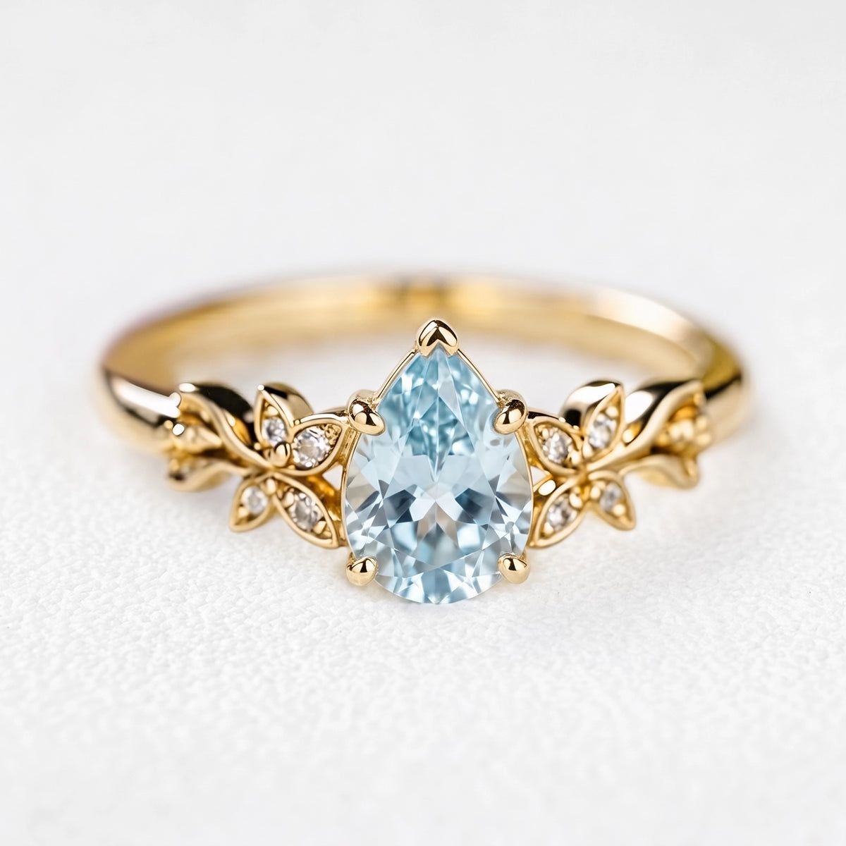 Marina’s Foliage | Pear Blue Aquamarine Botanical Engagement Ring