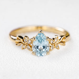 Marina’s Foliage | Pear Blue Aquamarine Botanical Engagement Ring