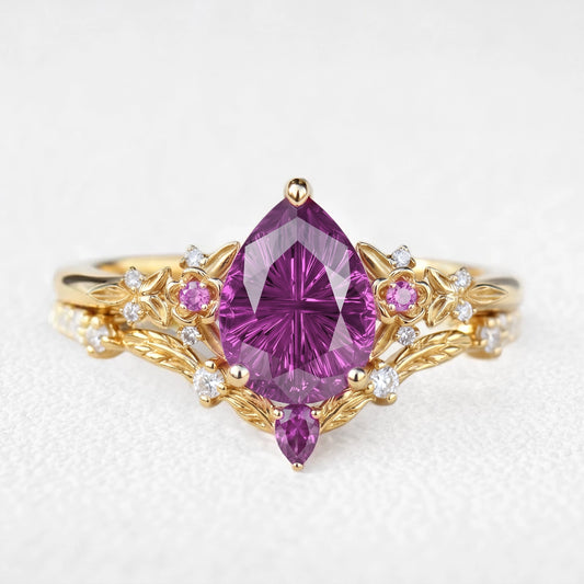 Theodora’s Diadem | Pear Fantasy-Cut Purple Sapphire Foliage Chevron Bridal Duo