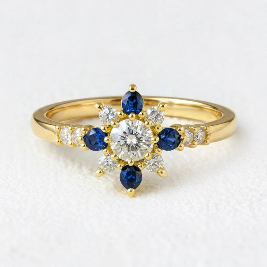 Sylvia’s Bloom | Round Diamond & Sapphire Petal Engagement Ring