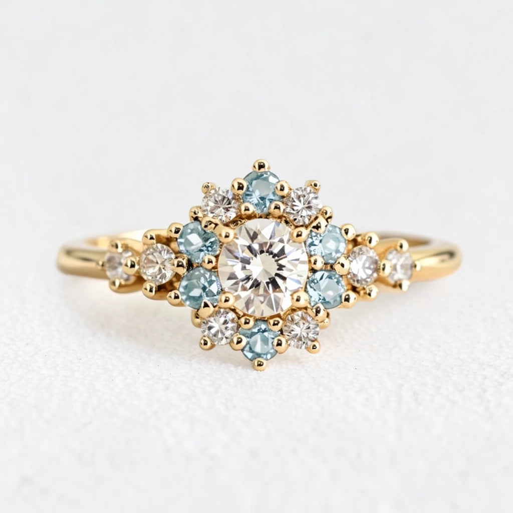 Liora's Corolla | Oval Diamond Engagement Ring with Aquamarine Petal Halo.