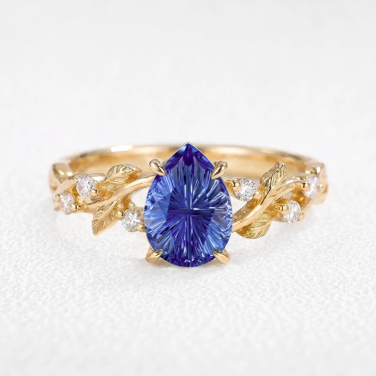 Theodora’s Diadem | Pear Fantasy-Cut Royal Blue Sapphire Foliage Engagement Ring