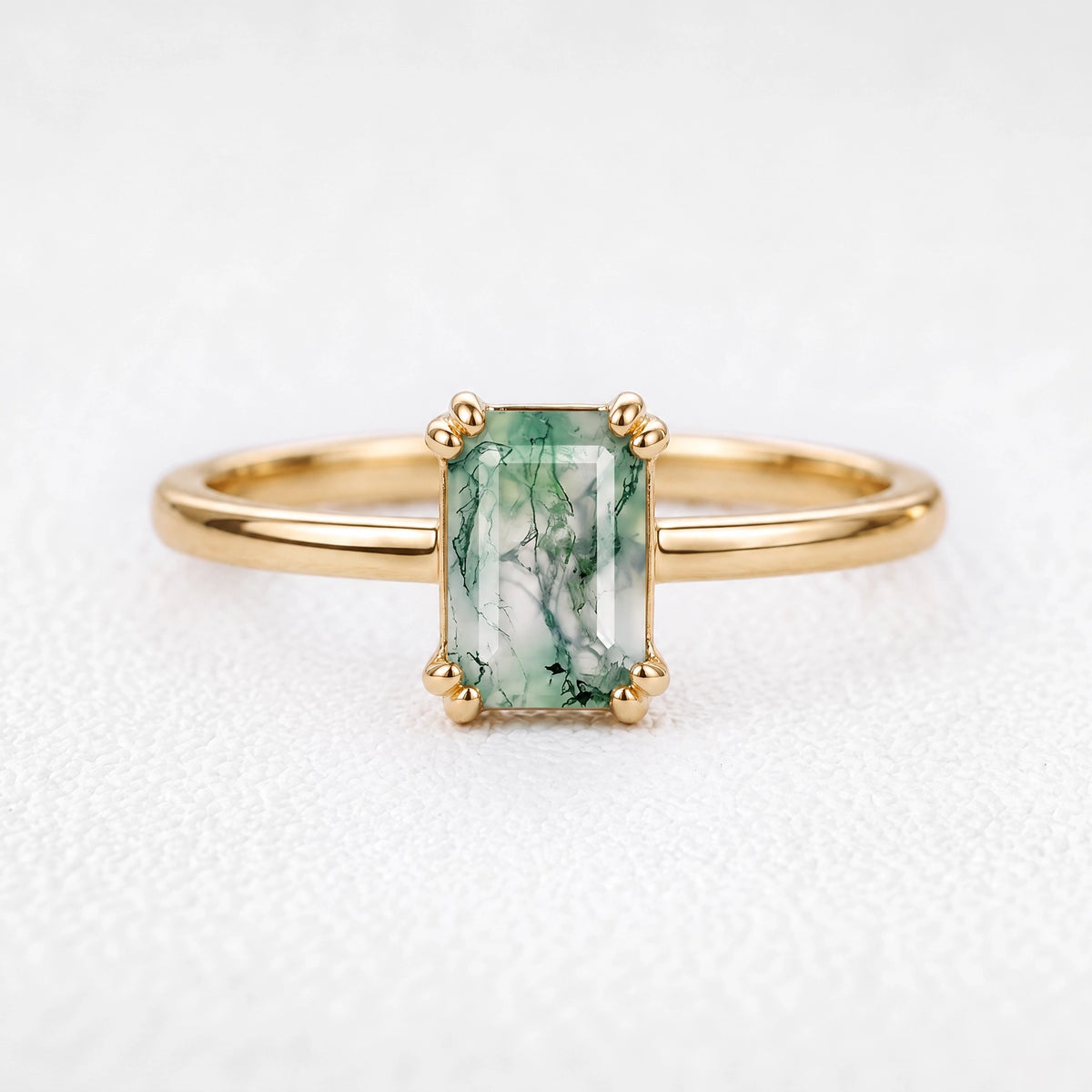 Cordelia’s Pavilion | Emerald Cut Moss Agate Solitaire Engagement Ring