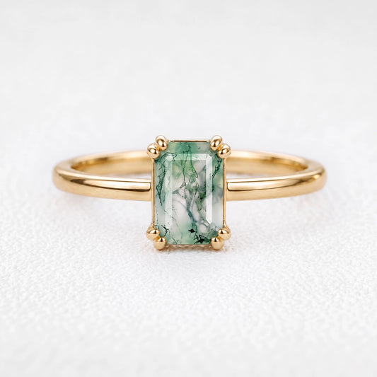 Cordelia’s Pavilion | Emerald Cut Moss Agate Solitaire Engagement Ring