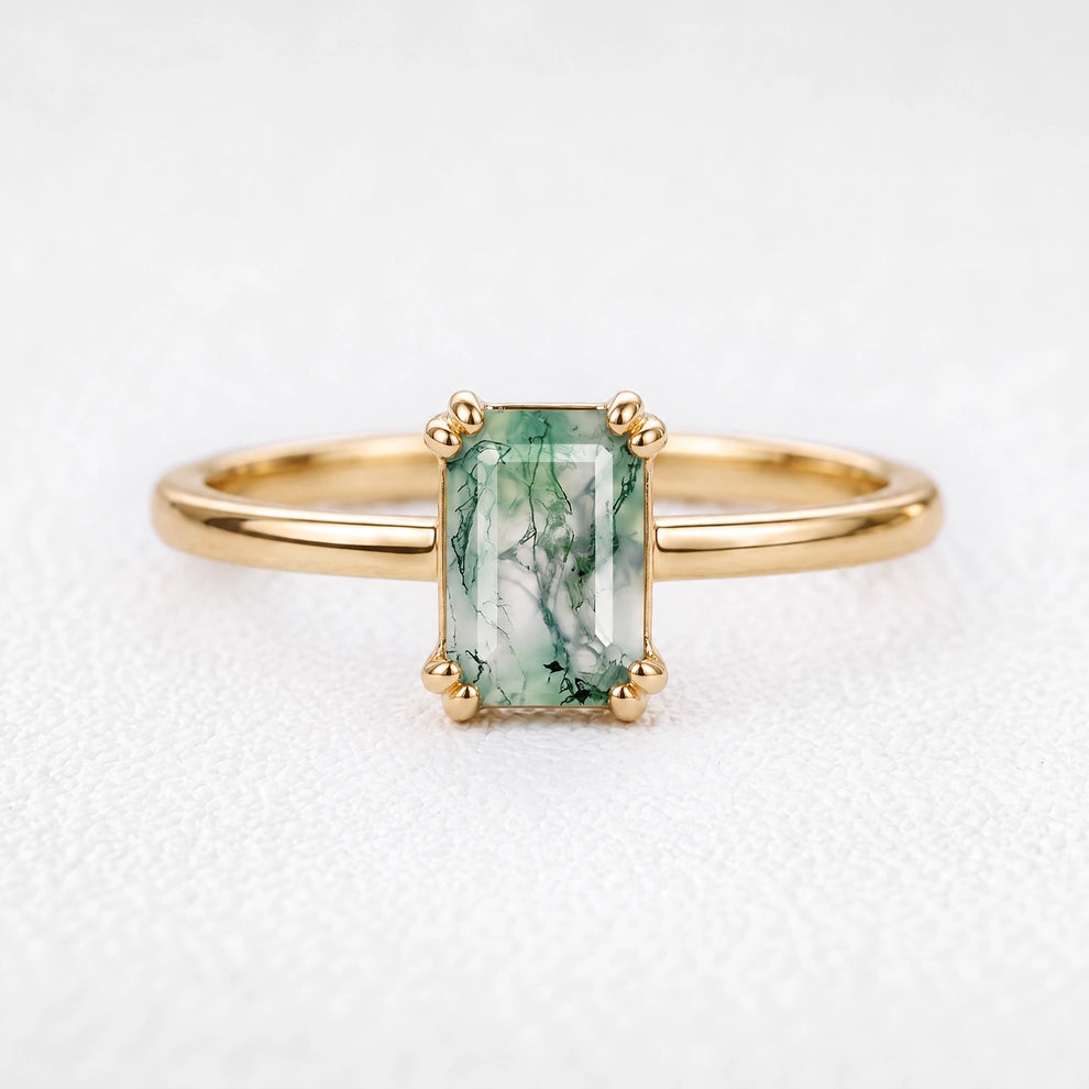 Cordelia’s Pavilion | Emerald Cut Moss Agate Solitaire Engagement Ring