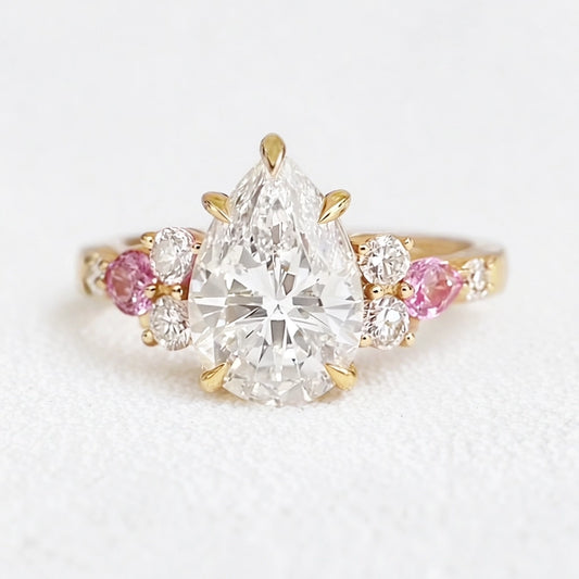 Aurora’s Embrace | Vintage 2CT Pear Cut Diamond Twin Trio Engagement Ring.