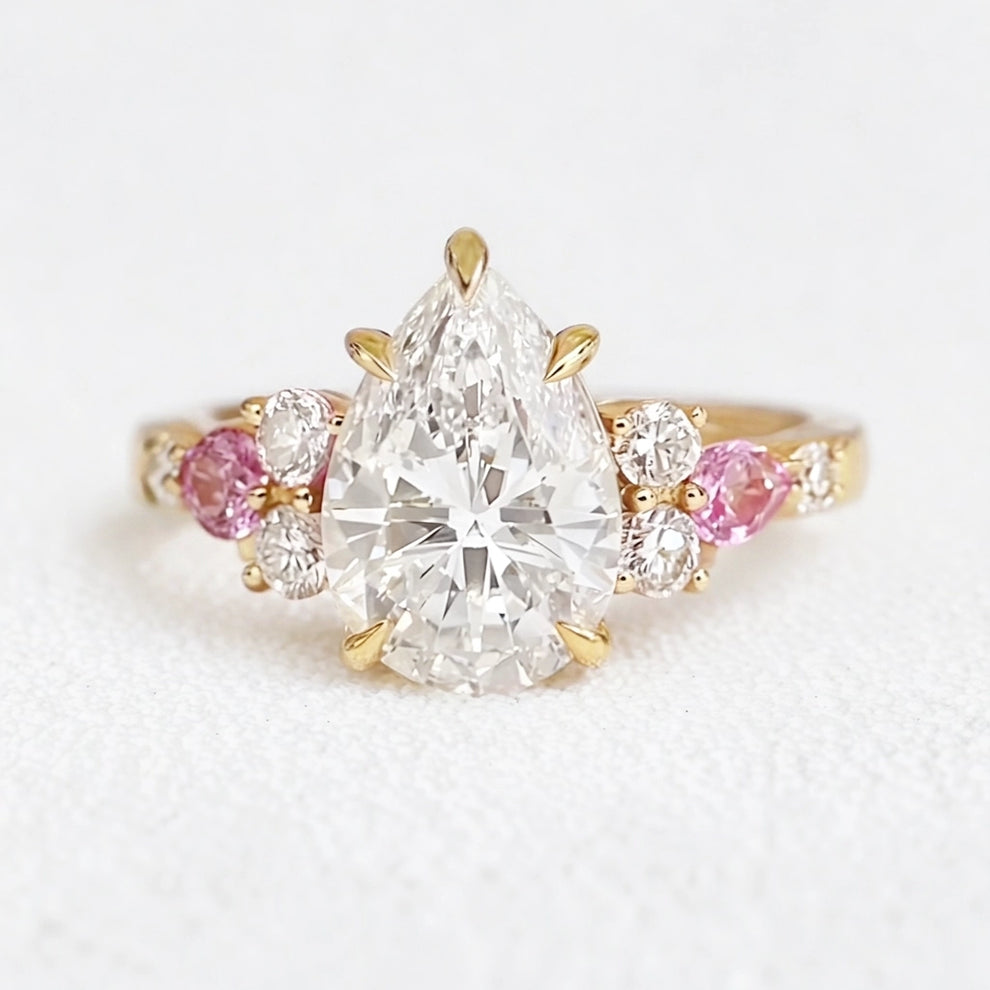 Aurora’s Embrace | Vintage 2CT Pear Cut Diamond Twin Trio Engagement Ring.