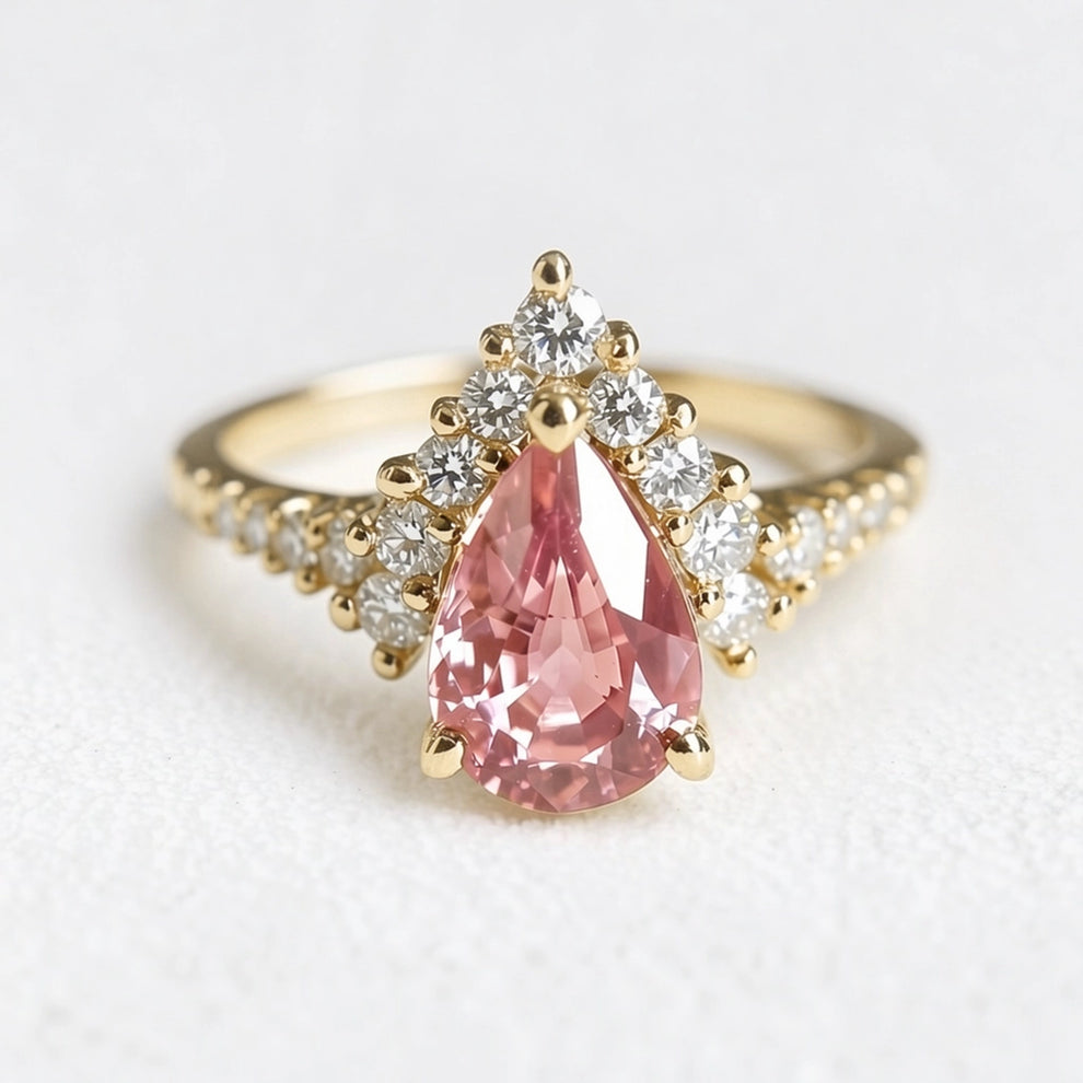 Aurora’s Promise |  Pear Cut Pink Sapphire Halo Engagement Ring.
