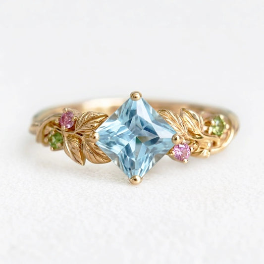 Cressida’s Stillness | Clear Blue Aquamarine Leafy Engagement Ring.