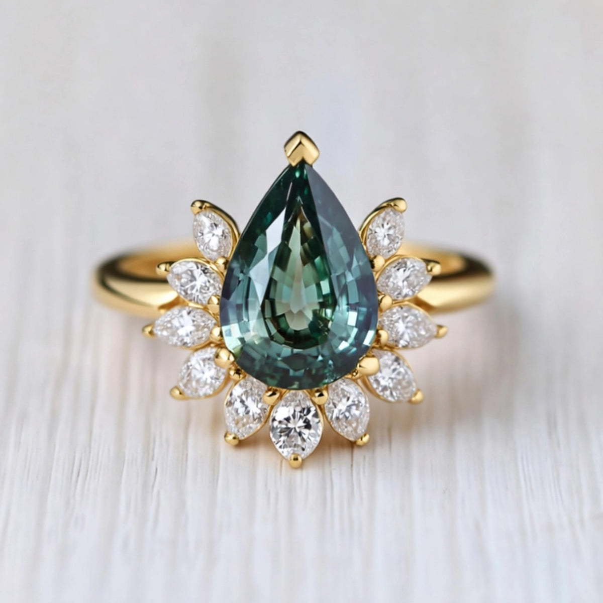 Lyra’s Hearth | Pear Teal Sapphire Engagement Ring.