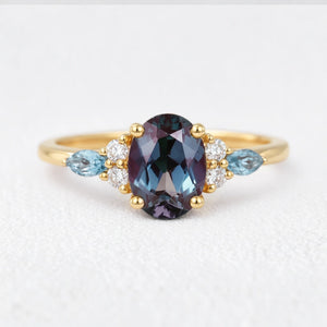 Theodora’s Rhapsody | Oval Alexandrite & Topaz Engagement Ring