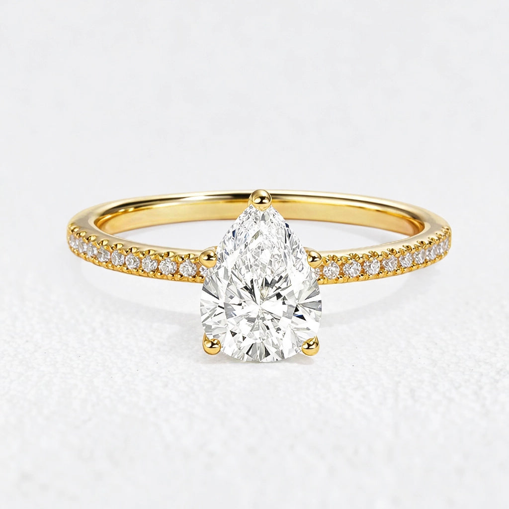 Lena’s Radiance | 1.5CT Pear Diamond Pavé Solitaire Engagement Ring