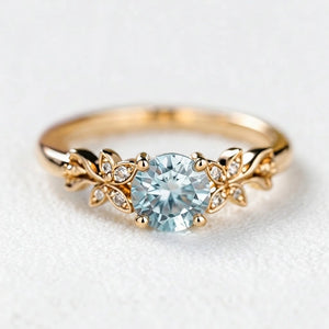 Marina’s Foliage | Round Blue Aquamarine Leafy Engagement Ring.