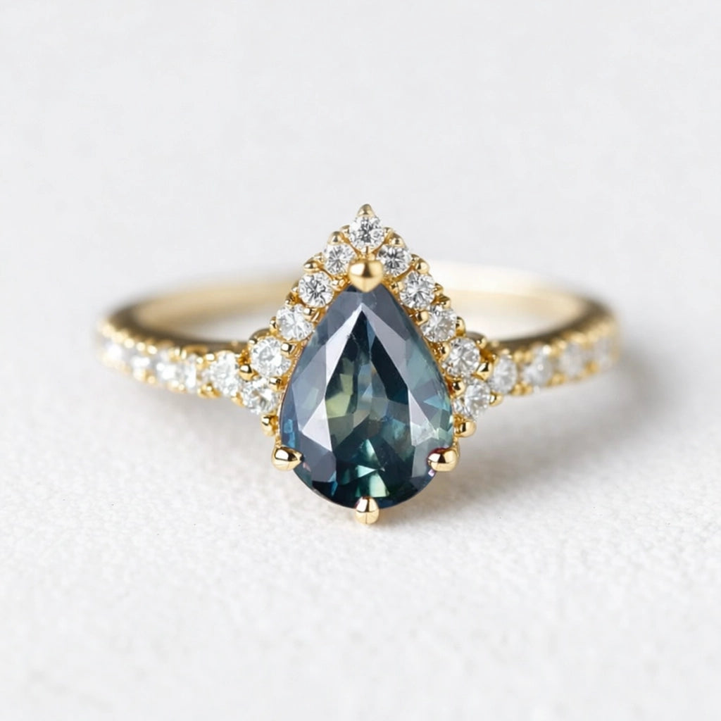 Aurora’s Teardrop | Pear Blue Sapphire Half-Halo Ring.